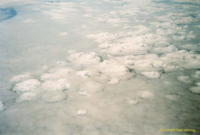 cloud layer with<BR>rising (cloud hills)<BR>and sinking (rings) air
