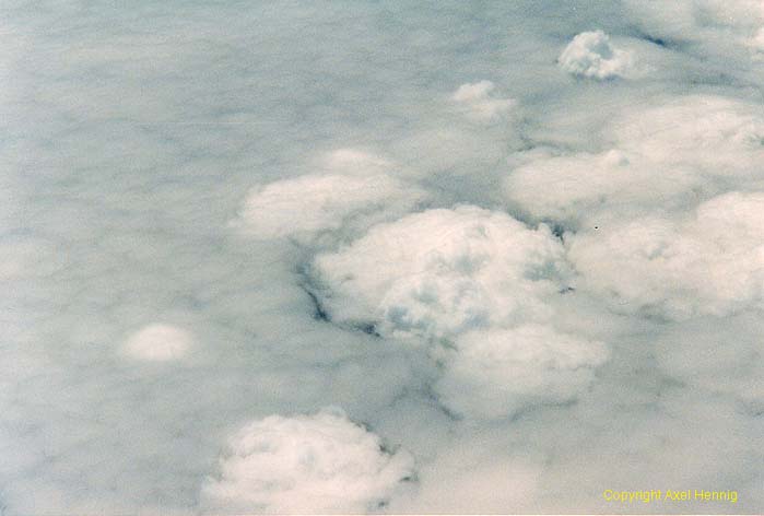 cloud layer with<BR>rising (cloud hills)<BR>and sinking (rings) air